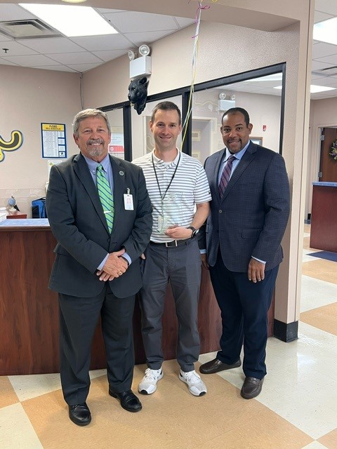 Pictured l-r: Putnam County Schools Superintendent Dr. Rick Surrency, 2024 Assistant Principal of the Year John Chaires, FDOE K-12 Chancellor Dr. Paul Burns